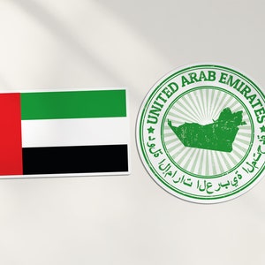 May include: A green and white sticker with the text "UNITED ARAB EMIRATES" and a map of the United Arab Emirates. The sticker is next to a red, white, and green flag of the United Arab Emirates.