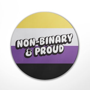 May include: A round sticker featuring the non-binary pride flag colours: yellow, white, purple, and black. The text "NON-BINARY & PROUD" is written in white, bubble letters.
