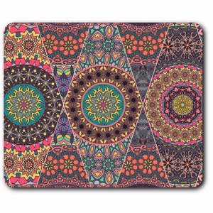 May include: A colourful mouse mat with a geometric pattern of overlapping circles and triangles. The design features a variety of colours, including pink, blue, green, yellow, and brown.