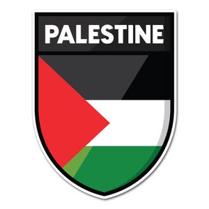 May include: A shield-shaped sticker displaying the Palestinian flag. The design incorporates a red triangle, black, white, and green horizontal stripes. The word "PALESTINE" is printed in white capital letters on a black banner at the top.