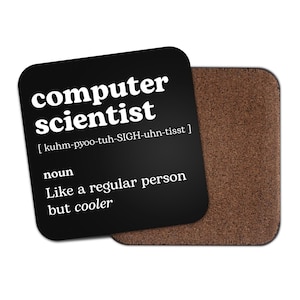 May include: Black coaster with white text that reads "computer scientist" and a phonetic pronunciation of the word. The text also reads "noun" and "Like a regular person but cooler."