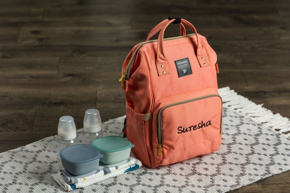 Diaper backpack top with usb port