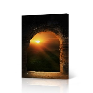 May include: A stone archway with a view of a sunset over a forest. The sun is shining brightly and the sky is a vibrant orange and yellow.