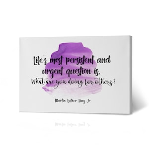 May include: Purple watercolor background with a quote by Martin Luther King Jr. that reads "Life's most persistent and urgent question is. What are you doing for others?"
