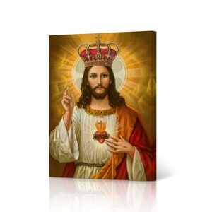 May include: A painting of Jesus Christ wearing a golden crown with a red jewel. He is wearing a white robe with a red and gold sash. His heart is exposed and is on fire with a cross on top. The background is a golden halo with rays of light.