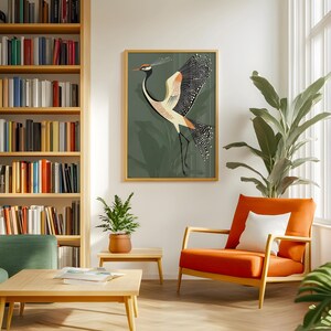 May include: A framed illustration of a stylized bird with black, white, and orange markings on a green background.