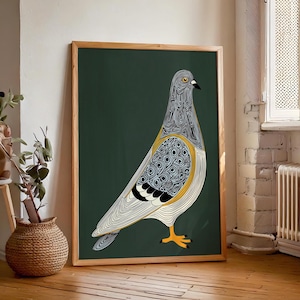 May include: A framed art print featuring a stylized pigeon illustration. The bird is depicted with intricate black and white patterns, yellow accents, and a dark green background. The artwork is encased in a natural wood frame, suitable for home decor.