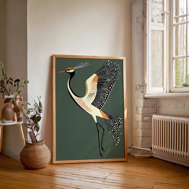 May include: A framed print of a stylized illustration of a crane with black, white, orange, and yellow markings on a dark green background.