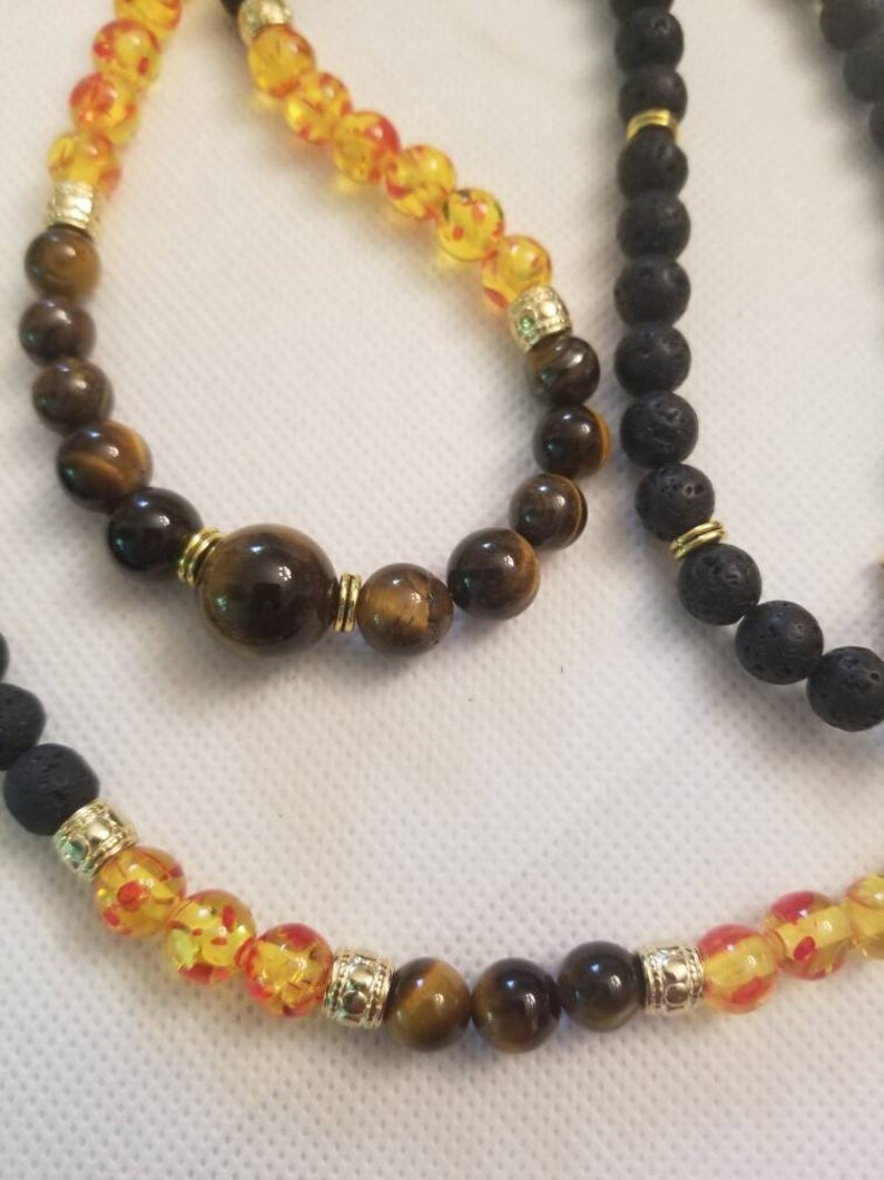 . Men/'s lava stone with amber beads /& tiger eye size or stone 25 long 39.99 for set can be customized Free SH size 7 or 8 for bracelet