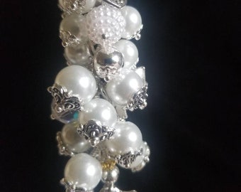 Purse Charms. One of a kind. Its full of bling with lots and lots of dangles and charms.  Free Shipping and Handling