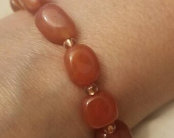 Genuine Carnelian Stones. Choose chain link, stretch with copper beads or bronze beads. Size 6, 7 or 8. Customizable