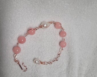 Genuine Rose Quartz wire wrapped bracelet with pearl focal point and another pearl as a dangle