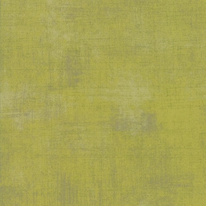 May include: A textured fabric in a muted green color with a subtle pattern.