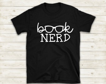May include: Black t-shirt with white text that reads "book nerd" and a pair of glasses graphic.