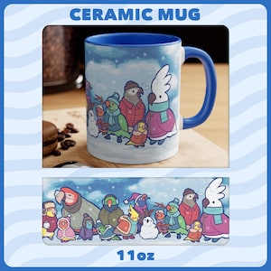 May include: Ceramic mug with a blue interior and handle, depicting a winter scene with cartoon birds in scarves and coats. The mug has a capacity of 312 grams.
