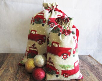 Borsa regalo in flanella con stampa di camion rosso, borsa in tessuto con coulisse ecologica