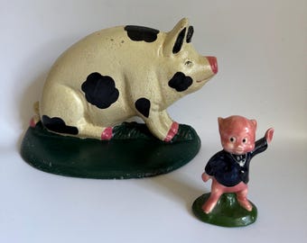 Vintage Cast Iron Pig Doorstop and 1975 Porky Pig Figurine