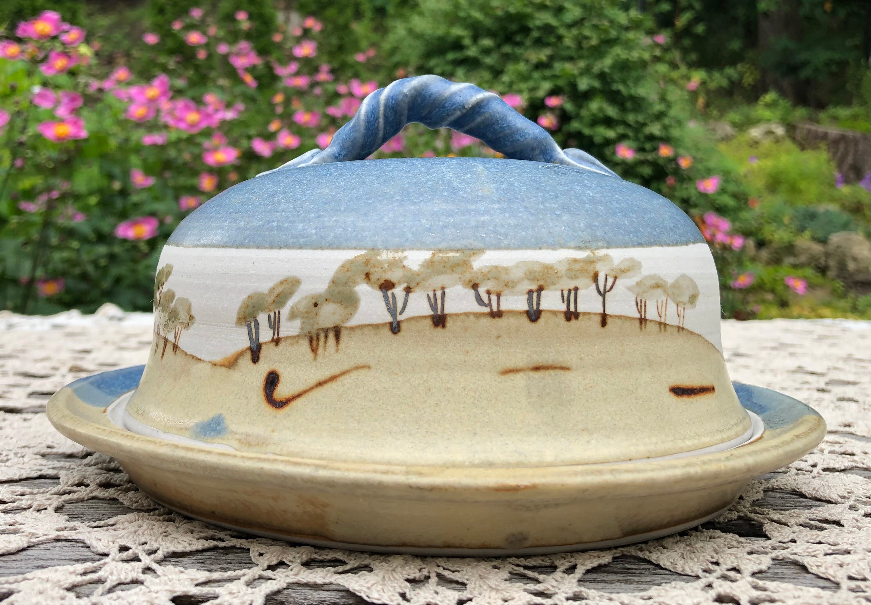 Pottery top cheese dish