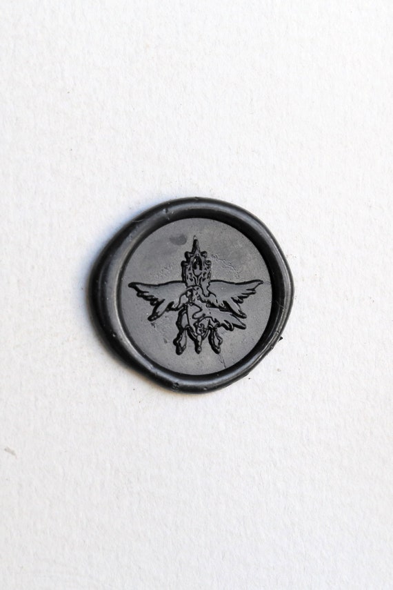 Custom made family crest wax seal design