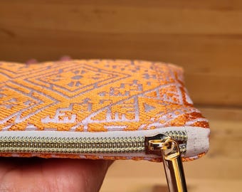 Kleine Kosmetiktasche aus marokkanischem Stoff | Schminktasche Tarz el Fesi Muster | orange, leicht schimmernd