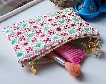 Small boho chic makeup bag made of Moroccan fabric with oriental ornamental patterns