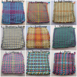 Woven potholders from left to right: Large blue raspberry (colors blue, magenta, and dark purple), Large candy (colors coral, pink, lime green, teal and yellow), Large fall garden (colors green, yellow and orange), Large sunflower (colors pale yellow, lemon yellow, orange, coral, red, and green), Large Hydrangea (colors dark green, magenta, and dark purple), Large Lollipop (yellow, teal, lavender, and pink), ... ran out of characters, please message me if you need assistance