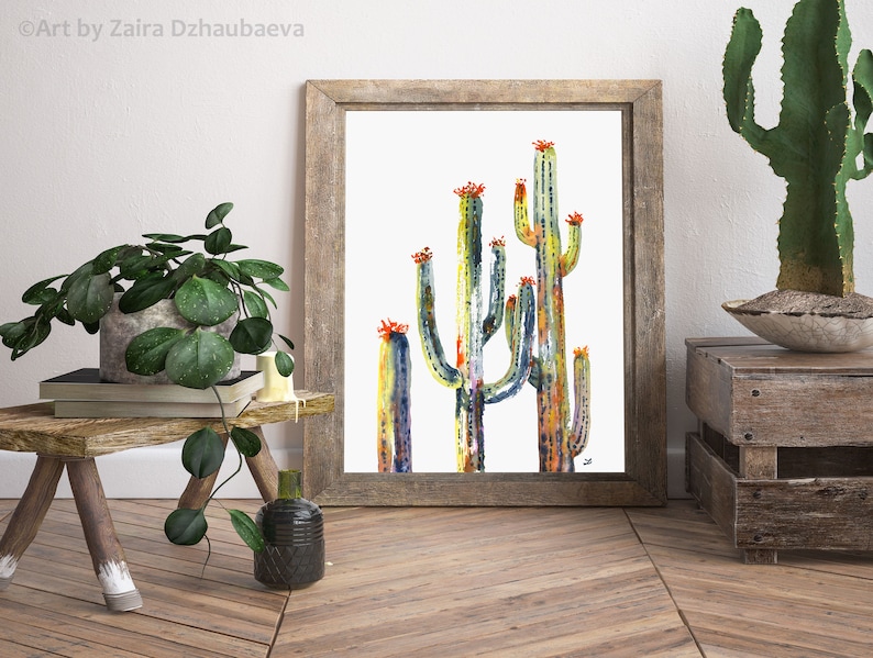 May include: A watercolor painting of a group of cacti with orange flowers. The cacti are painted in shades of green, blue, and yellow. The background is white.