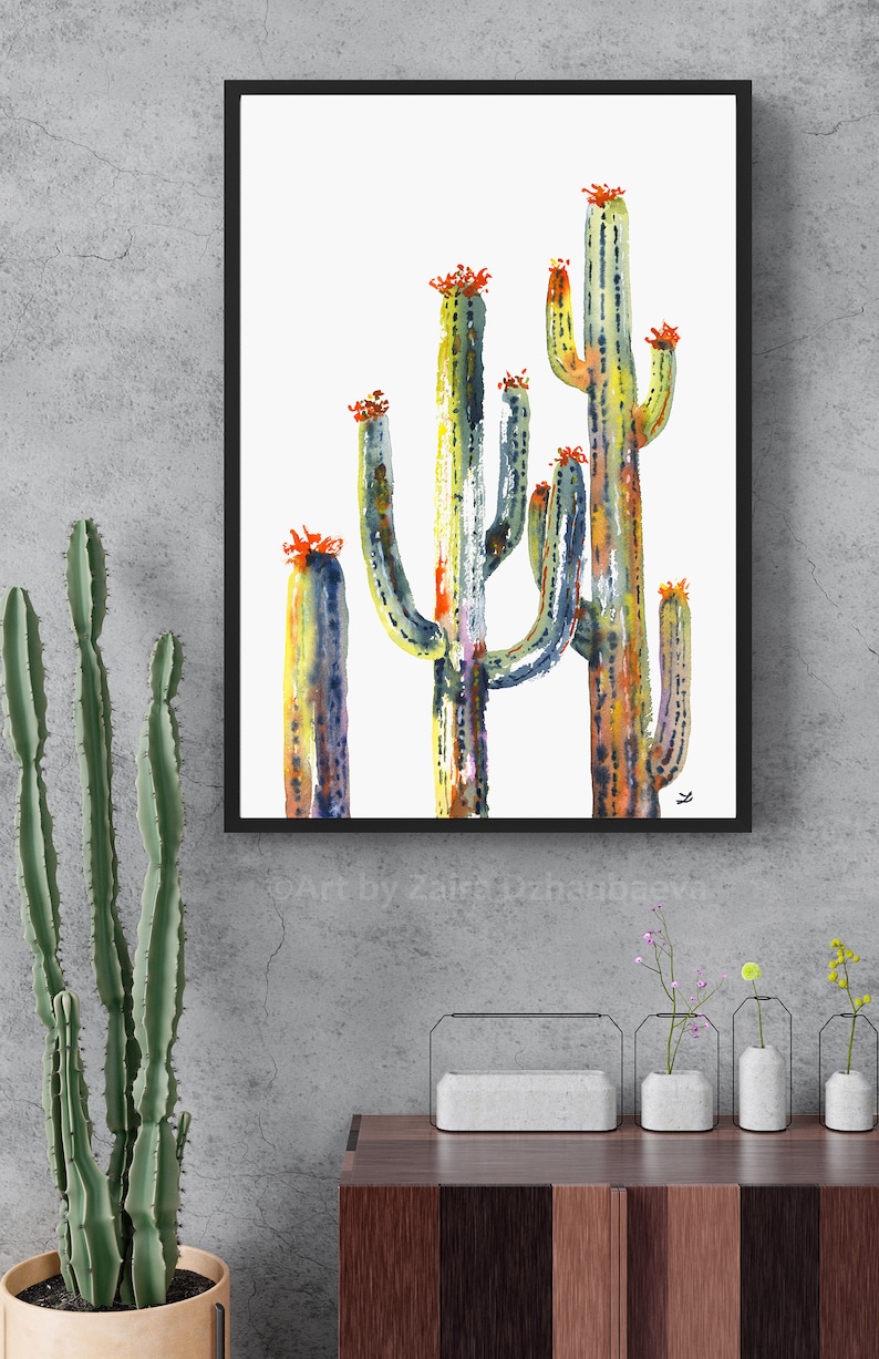 May include: A watercolor painting of a group of cacti in shades of green, yellow, and orange. The cacti are tall and slender, with a white background.