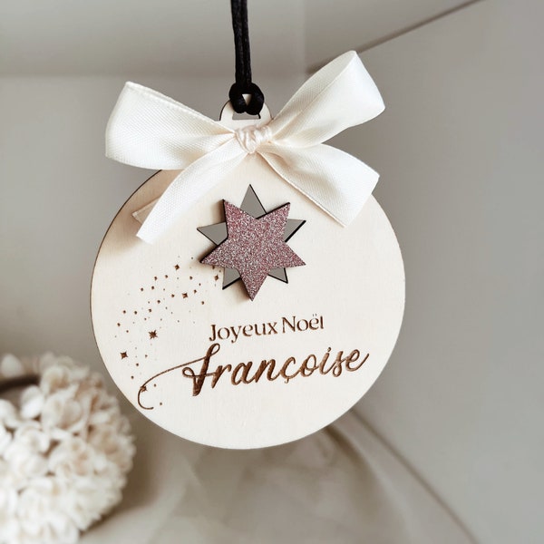 Christmas ball with personalized first name and white satin ribbon