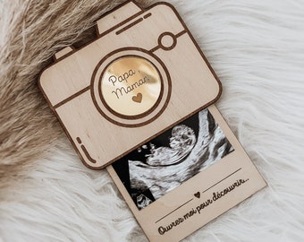 Pregnancy announcement in the shape of a camera and personalized ultrasound