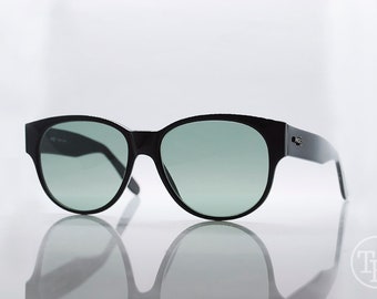 Oryginalne zabytkowe okulary przeciwsłoneczne INDO | Model CA-009 | Lata 90. | Duże czarne plastikowe oprawki | Nowe, nigdy nie noszone