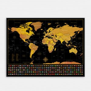 May include: A framed world map with a black background and gold-colored continents. The map includes country names and a compass rose. A border of country flags is at the bottom.