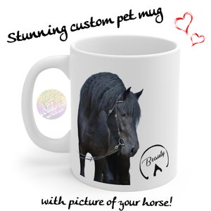 May include: White ceramic mug with a black horse image and the text "Beauty" in a circle with an arrow pointing up. The mug is a personalized pet mug.