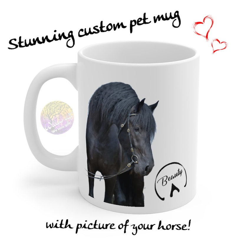 May include: White ceramic mug with a black horse image and the text "Beauty" in a circle with an arrow pointing up. The mug is a personalized pet mug.