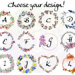 May include: Twelve different floral wreath designs with letters A through L in the center of each wreath. The wreaths are in various colors, including red, blue, green, pink, and white.
