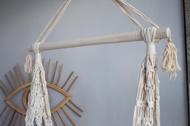 white macrame swing chair
