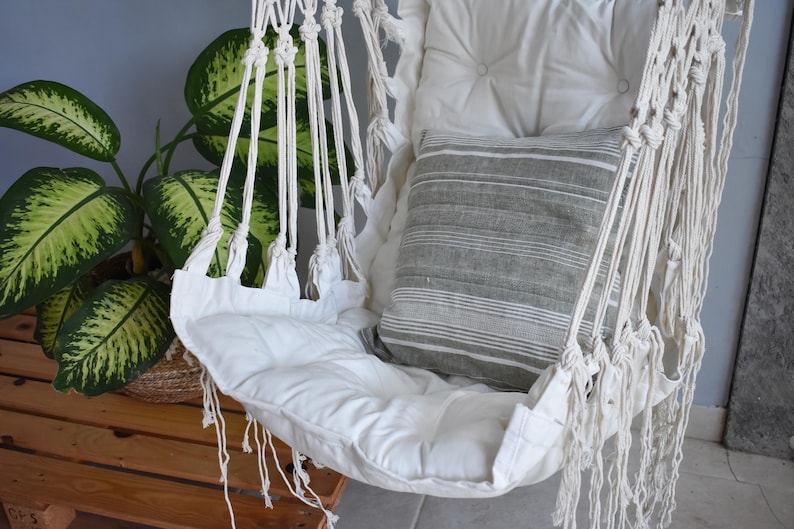 white macrame swing chair