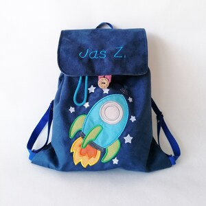 A personalized backpack for a preschooler, a backpack with a name, a backpack for kindergarten, a backpack with a rocket