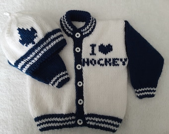 Handknit Baby hockey sweater and hat with leaf design 3 to 6 months.