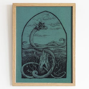 May include: A framed print of a black and white illustration of a dragon emerging from a body of water. The dragon is curled around a tower-like structure. The background is a teal blue colour.