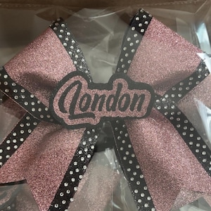 Glitterende cheerleadingstrik met strasssteentjes