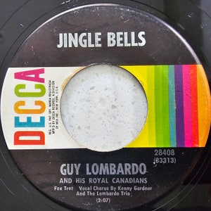 Guy Lombardo (e) - Jingle Bells / Santa Claus Is Comin&#39; - 1952 Reissue 7&quot; | Build A Fantastic Vinyl Record Collection | FREE UK Delivery