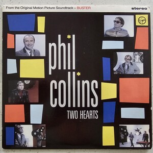 May include: A vintage vinyl record album cover for Phil Collins' "Two Hearts" from the "Buster" soundtrack. The cover is black with the artist's name in white, and features images of the artist and colourful geometric shapes.