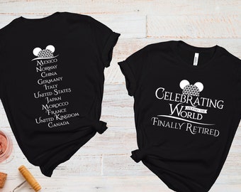May include: Two black t-shirts with white text and a Mickey Mouse head design. One shirt lists countries like Mexico, Norway, and Japan. The other says "Celebrating World Finally Retired."