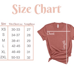 May include: Size chart for a t-shirt with measurements in inches for chest and length. The chart shows sizes XS through 2XL with corresponding chest and length measurements.