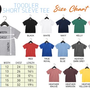 May include: Size chart for toddler short sleeve tees. The chart shows measurements for width, chest, and length in inches for sizes 2T, 3T, 4T, 5/6T, and 7T. The chart also shows different color options for the tees, including black, white, navy, kelly green, pink, red, true royal, baby blue, heather dark grey, heather athletic, heather mauve, heather maroon, and heather yellow gold.