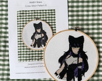 May include: A cross stitch pattern of Blake Belladonna from the anime series RWBY. The pattern is in a hoop and shows Blake with her black cat ears and purple hair. The pattern is designed and produced by Jessica Cameron of Stuff Jess Sews.