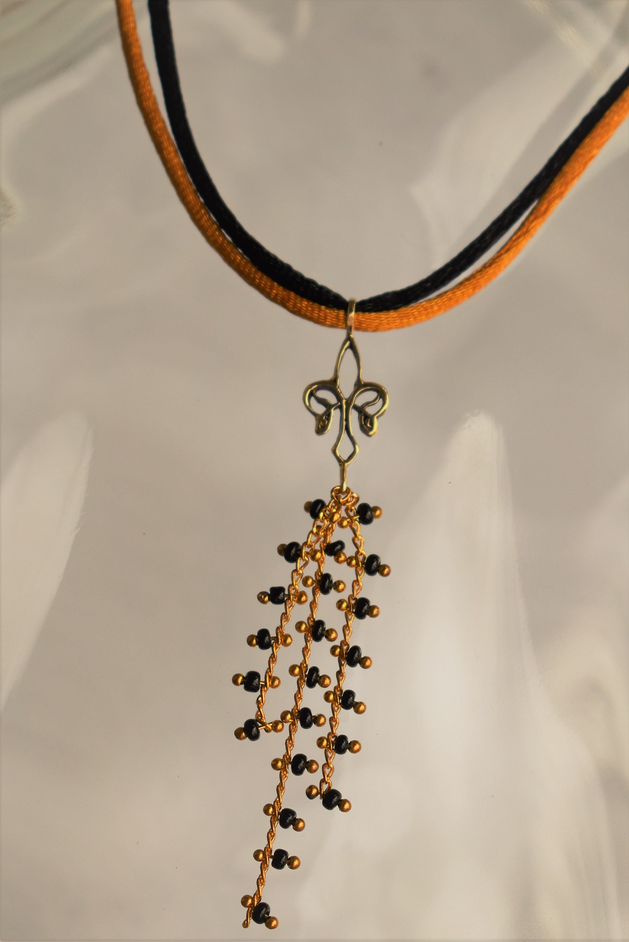 Fleur De Lis Tassle Necklace on Silk Cord - Etsy