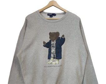 Vintage 90s Polo Bear Polo Ralph Lauren Silver Polo Bear Wearing indigo denims robe jacket Streetwear jumper size Large Polo Ralph Lauren