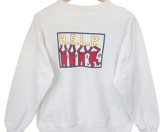 Sudadera vintage Keith Haring Pop Shop de los años 00 con cuello redondo, talla grande. Keith Haring HELP, estilo vintage con gráfico de la escena pop art, color blanco.